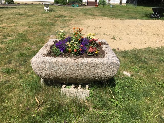 The trough has been moved several times over the years, and now resides at the Walker Valley home of Chris Bailey.